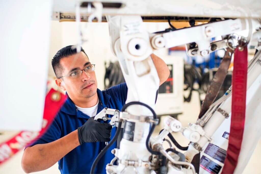 Sun Air Jets maintenance technician working Sun Air Jets maintenance technician working