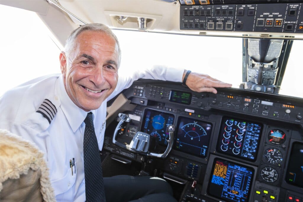 Sun Air Jets' pilot in jet cockpit