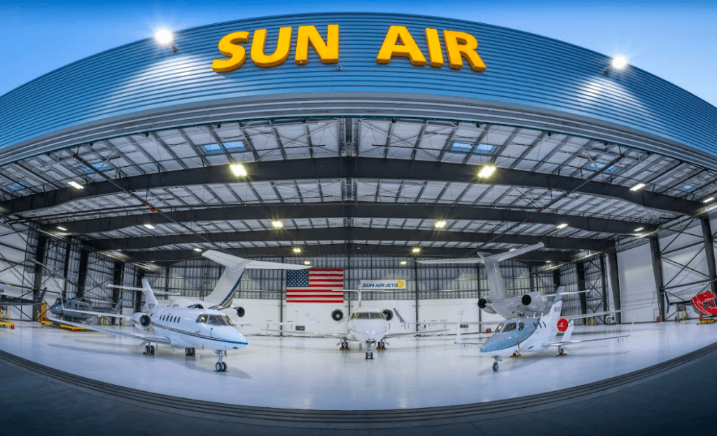 Sun Air Jets hanger with several types of private jets