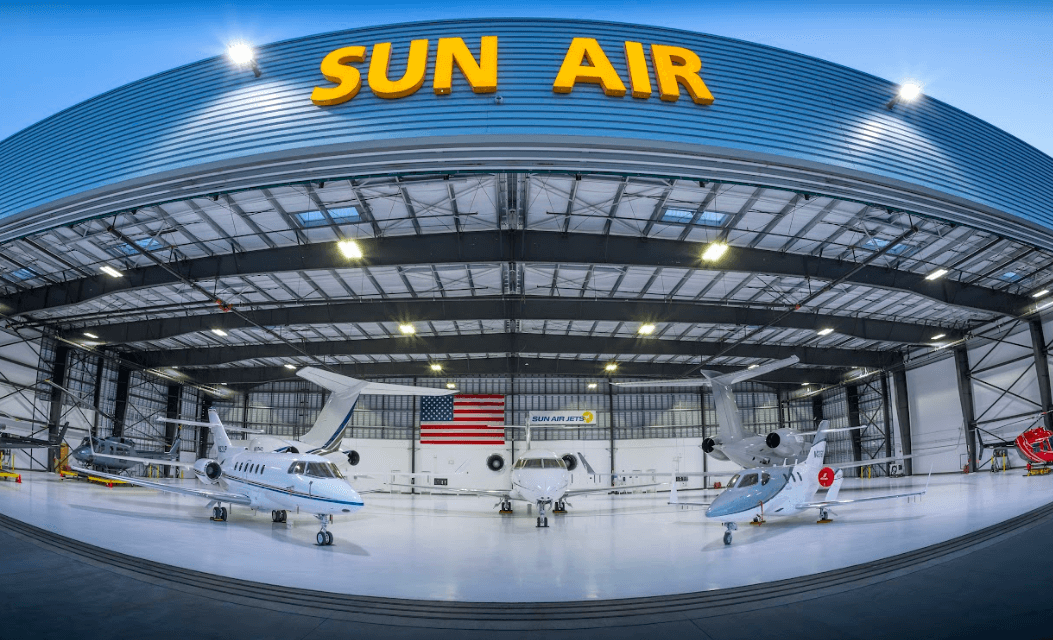 Sun Air Jets hanger with several types of private jets