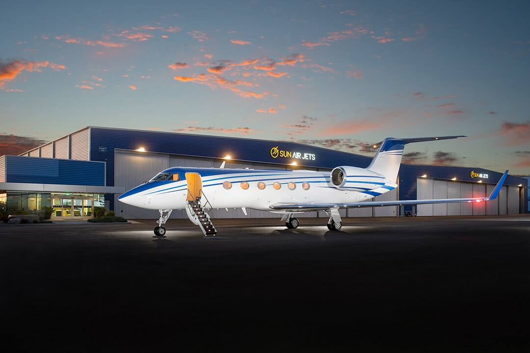 GIVSP-PD-1 gulfstream charter jet in front of hangar Los Angeles Van Nuys Airport